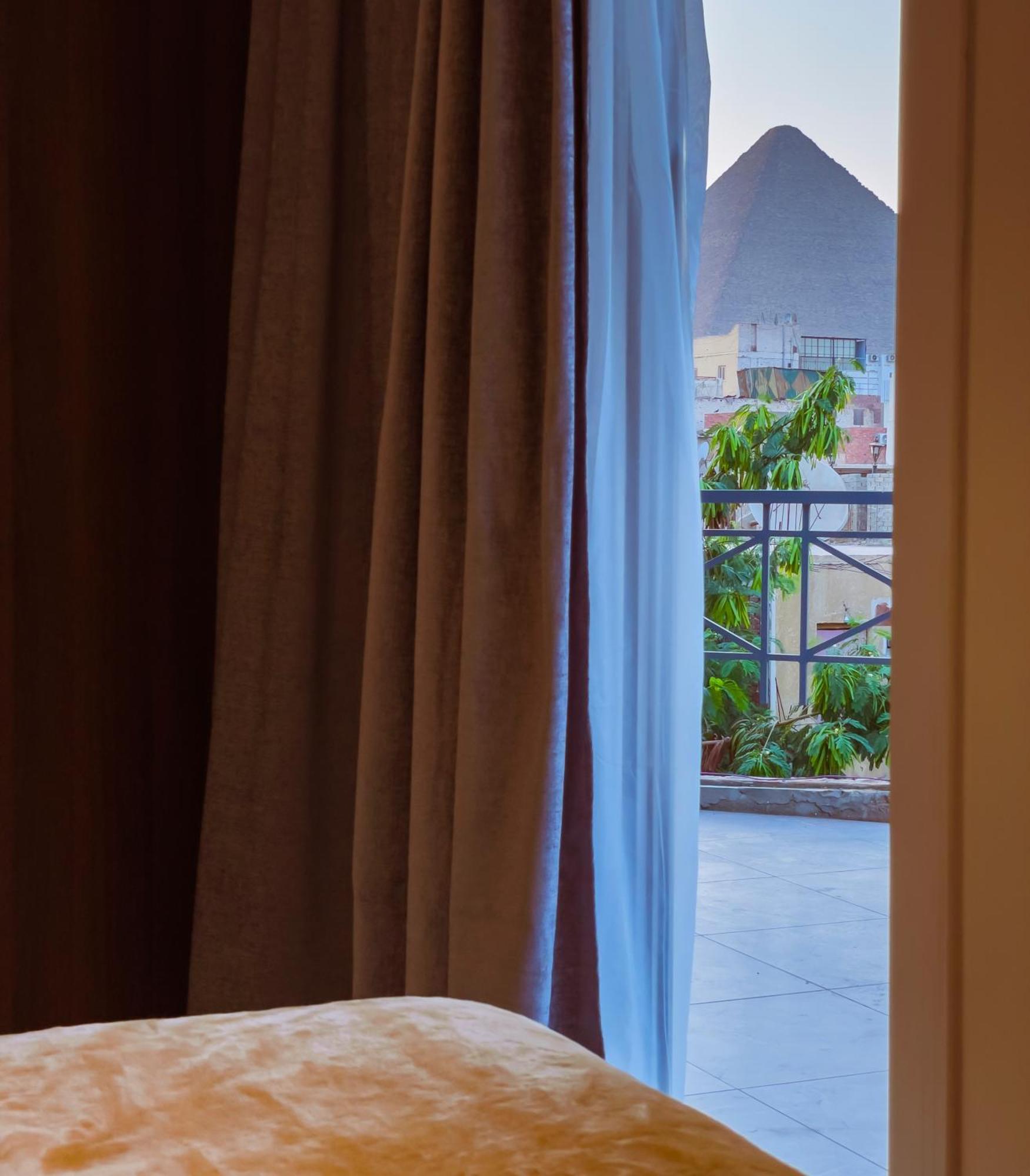 King Khufu Pyramids View Hotel Kafret el-Gabal Værelse billede